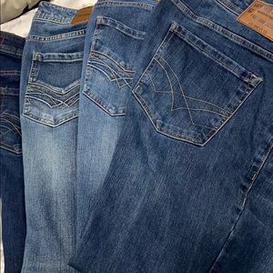 6 pairs of seven7 jeans